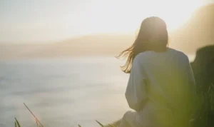 Reflective moment during a midlife transition, symbolising growth and self-discovery.